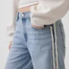 Vaqueros de talle bajo estilo años 90 con rayas laterales y corte holgado