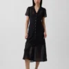 Vestido camisero midi transparente