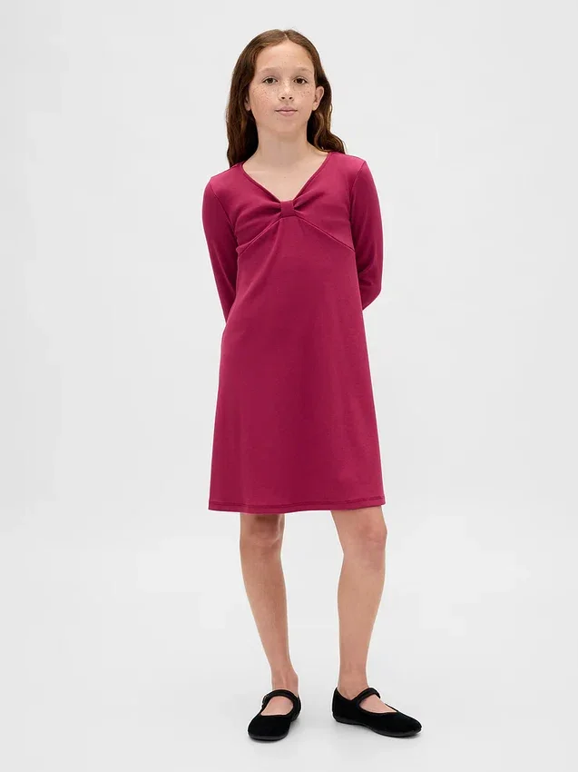 Vestido infantil de punto acanalado con moño