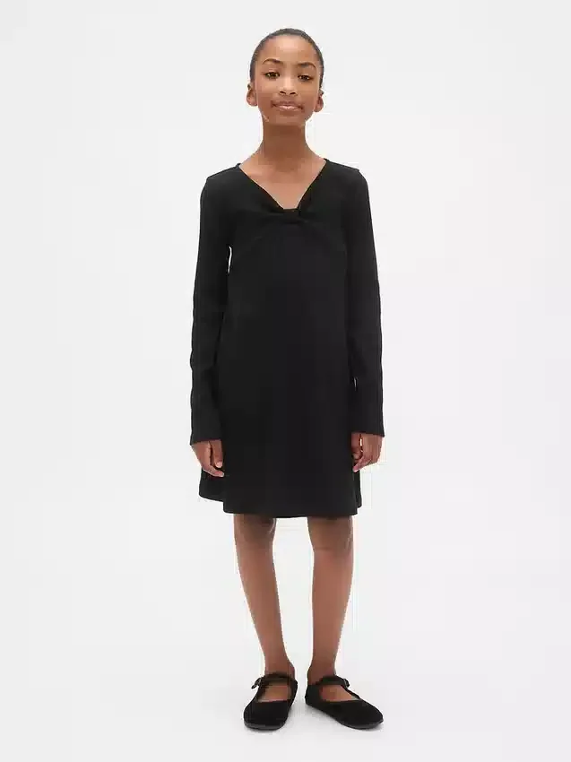 Vestido infantil de punto acanalado con moño