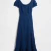 Vestido largo con mangas abullonadas bordadas