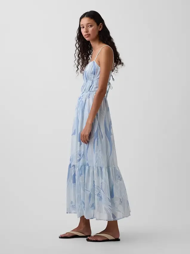Vestido largo con volantes y lazo en la espalda