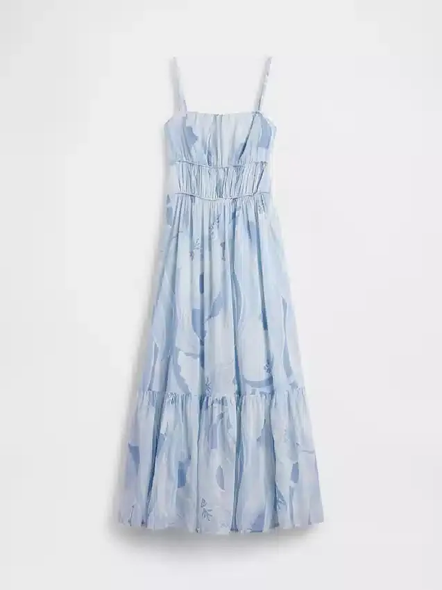 Vestido largo con volantes y lazo en la espalda