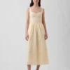 Vestido largo de cintura baja con costuras caladas