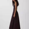Vestido largo de cintura baja con mezcla de telas