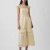 Vestido largo de voile con volantes de encaje