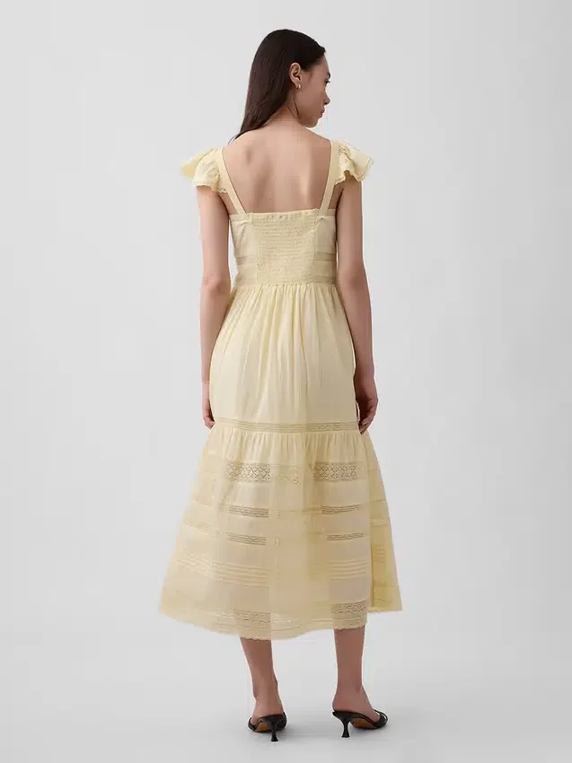 Vestido largo de voile con volantes de encaje
