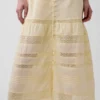 Vestido largo de voile con volantes de encaje