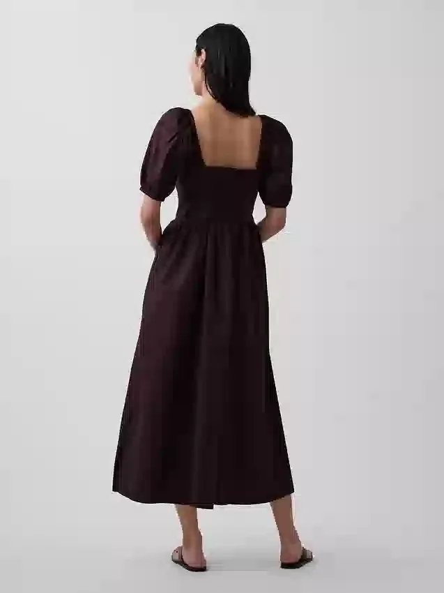 Vestido largo tipo corsé con mangas abullonadas
