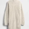 Vestido mini de jerséu oversize con cuello de tortuga