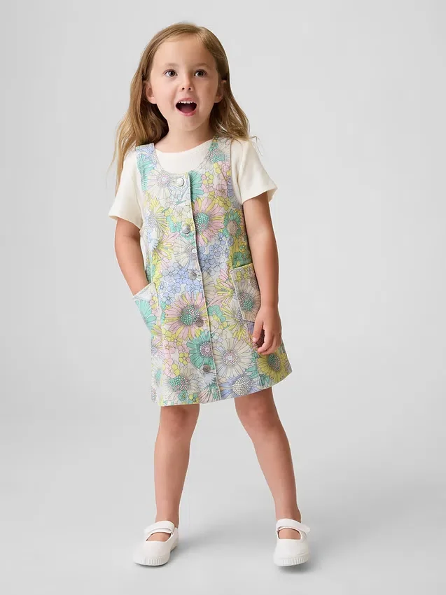 Vestido tipo jumper de mezclilla con estampado floral para bebés y niños